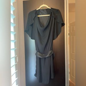 Benetton Sheer Little Black Dress with silver fabric studded belt.    Size M/34